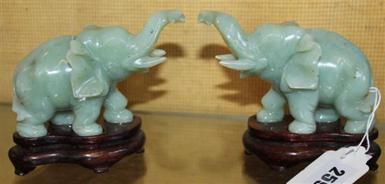 Pair jade carved elephants on stands